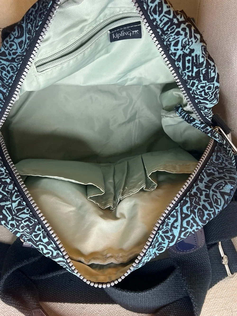 Teal and Black Patterned Shoulder Bag with Multiple Pockets